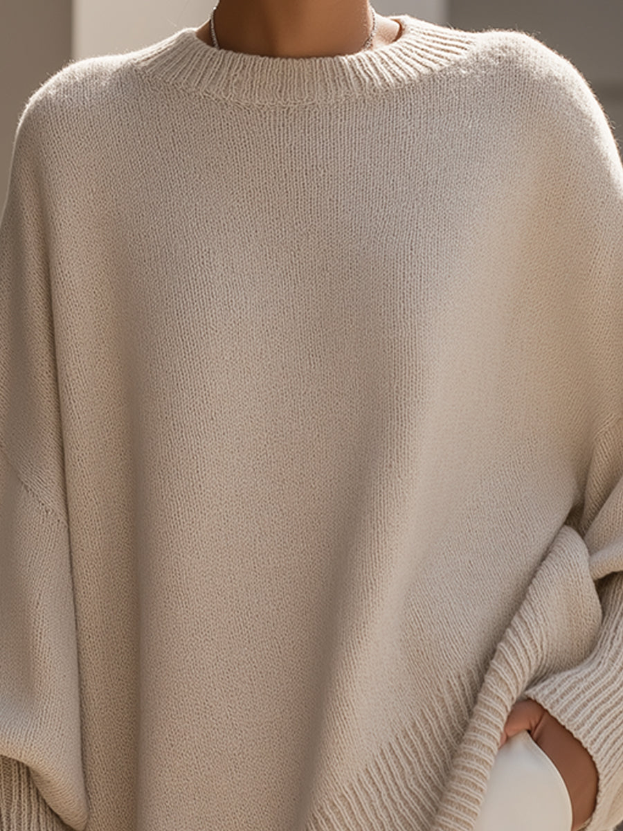 Amira – Elegancki sweter z asymetrycznym dołem