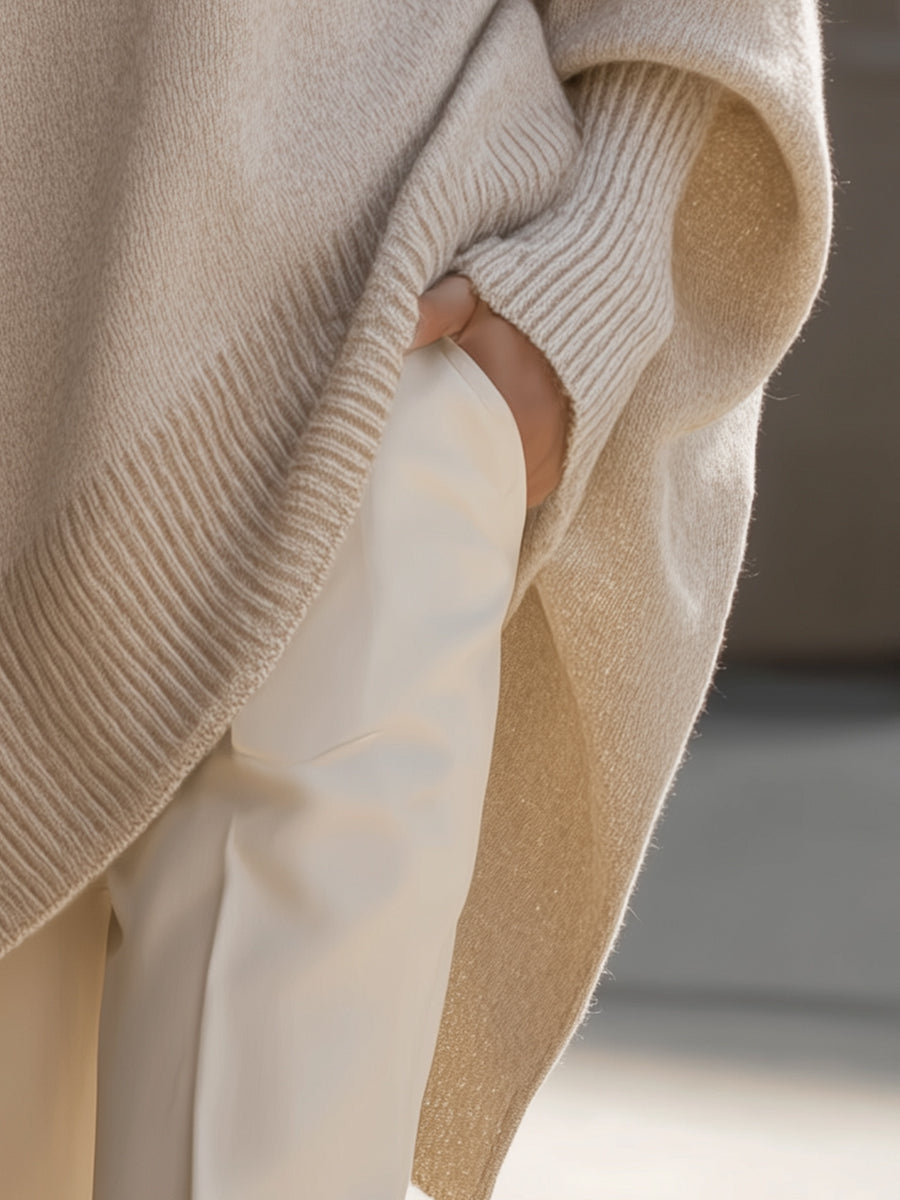 Amira – Elegancki sweter z asymetrycznym dołem